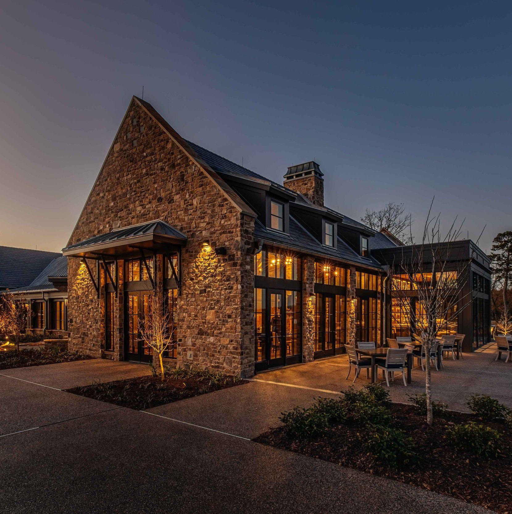 Stone clubhouse at twilight